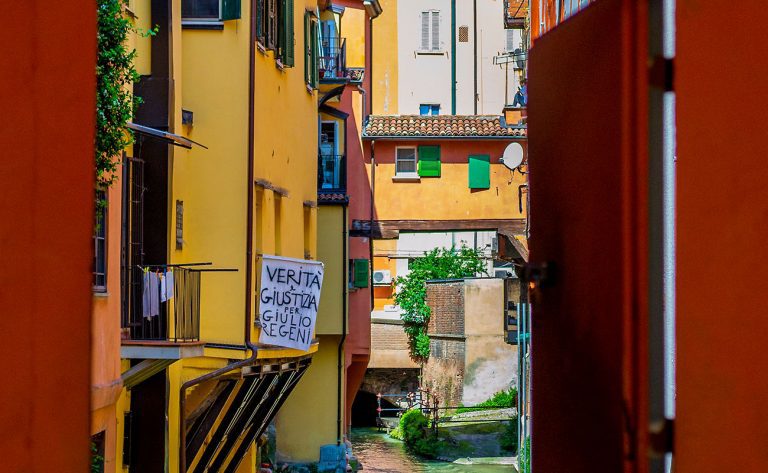 BOLOGNA, ITALY - May 24, 2018: View from Via Piella of the Finestrella on the Canale delle Moline, one of the city's underground canals.