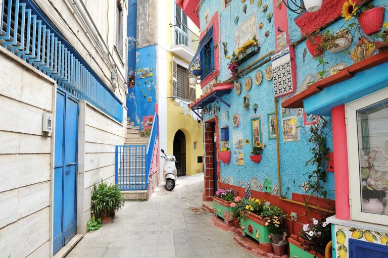 VIETRI SUL MARE, ITALY - April 27, 2018 View on the narrow street of colored house, with traditional ceramics decoration of the city Vietri sul Mare, Amalfi Coast, Italy