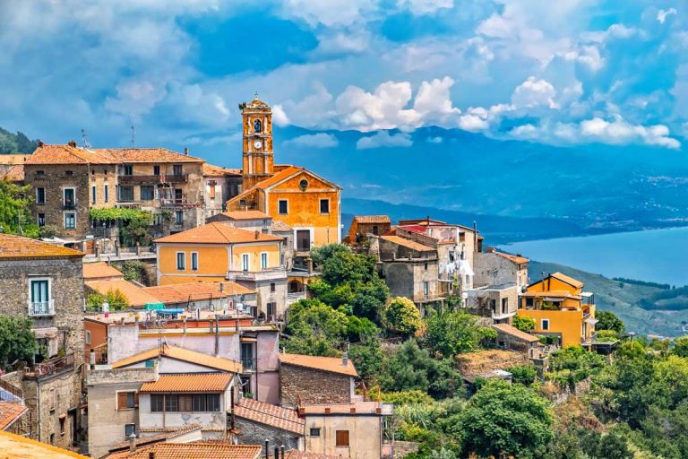Picturesque shot of historic village Pollica at the Cilento national reserve in Italy. The background shows the coastline of the mediterranean sea.