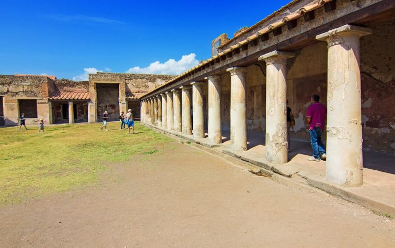 Pompeii, Italy - 08.21.2014: Stabian Baths at ancient Roman city Pompei, buried under ashes after eruption of Vesuvius. Ancient frigidarium or cold baths, Campania, Italy. UNESCO World Heritage Site