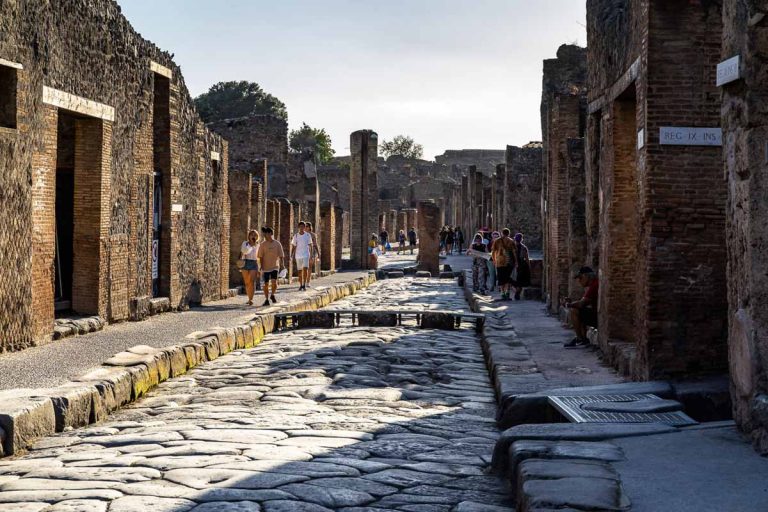 Via dell'Abbondanza is a scenic paved stone street of the Roman city of Pompeii, an UNESCO World Heritage Site. Pompeii, Campania, Italy, October 2019