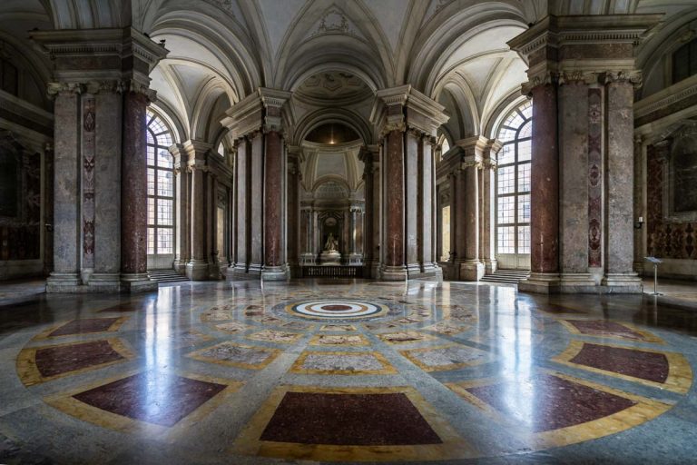 Main floor of Caserta Royal Palace and entrance to the royal apartments. Caserta, Italy, October 2019