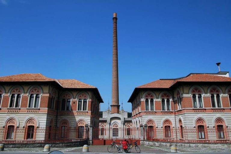 Crespi d'Adda (Lombardy, Italy) - Chimney and building in the historic industrial village
