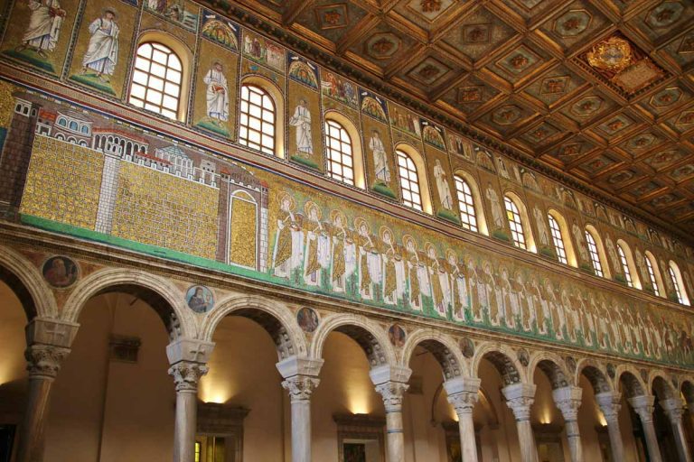 Ravenna, Italy - April 14, 2018: Inside the medieval Basilica di Santâ€™Apollinare in Ravenna, built in the 5th century. Famous  particularly for its wall mosaics. Italy, South Europe