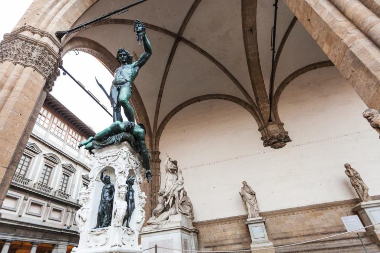 travel to Italy - outdoor statue of Benvenuto Cellini's Perseus with the Head of Medusa in loggia dei lanzi piazza della signoria in Florence city