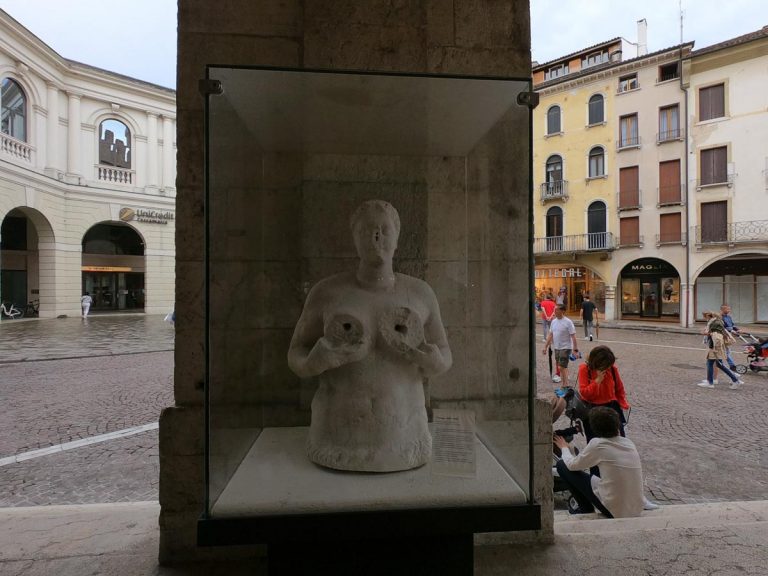 Treviso / Italy - June 22, 2019: The Fontana Delle Tette is an old fountain carved of Treviso, which under the rule of the Venetian Republic pours white and red wine during special celebrations.