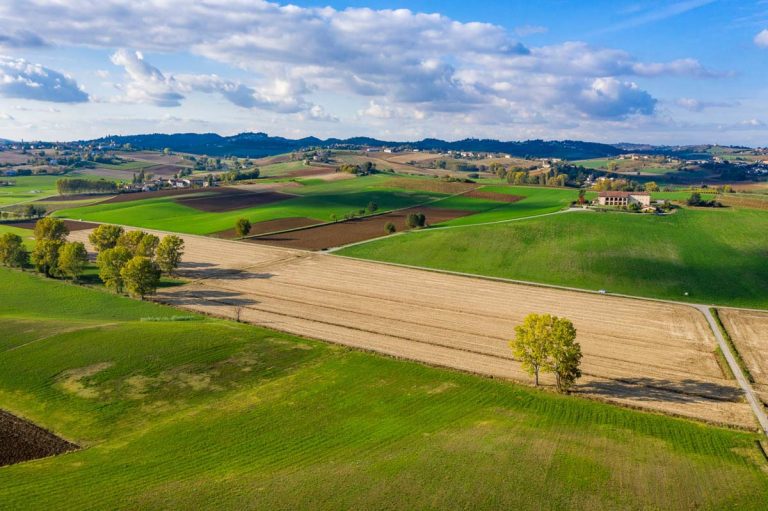 Aerial view of beautiful Italian countryside in Monferrato hills area. Drone shot near Casale Monferrato, Italy