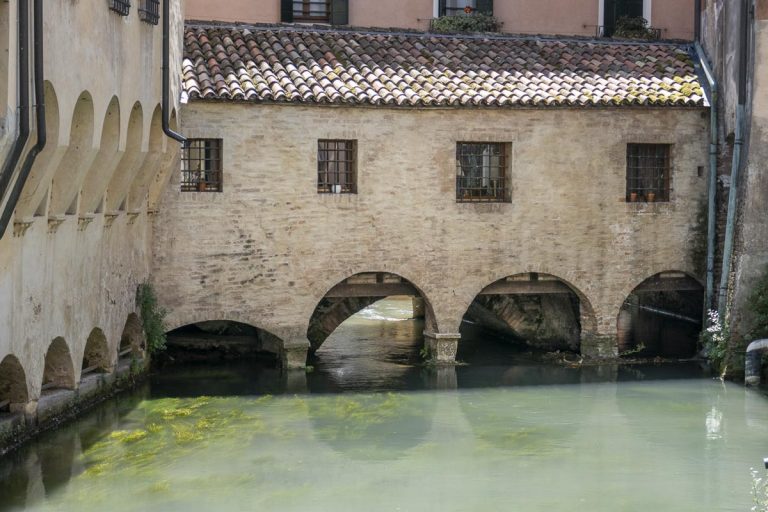 the beautiful coastline buildings in Buranelli canal Treviso, Italy