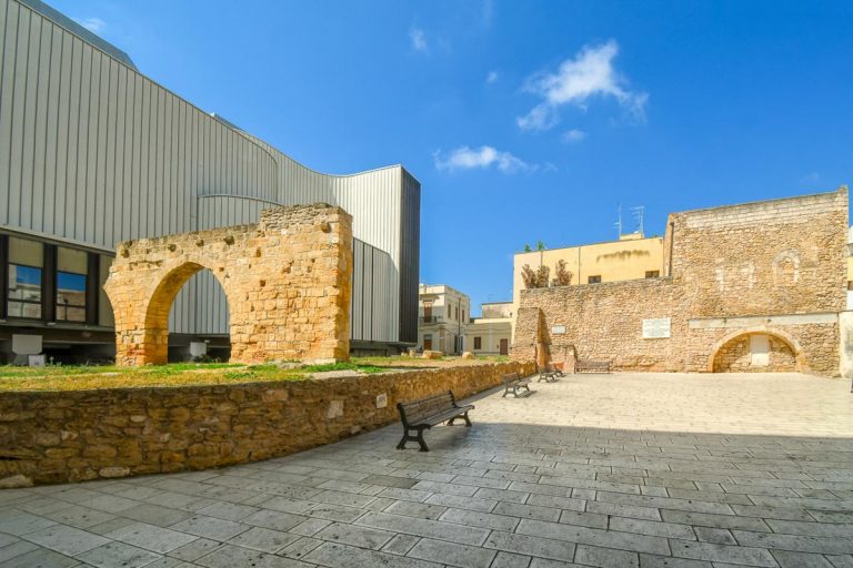 Brindisi, Italy - September 24 2018: Ancient Roman ruins on Piazza Sotille de Falco outside the archaeological area of San Pietro degli Schiavoni in the Brindisi, Italy