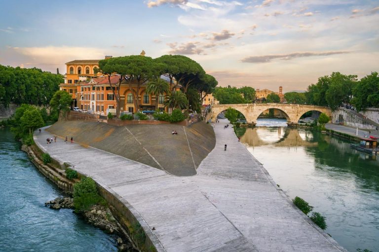 Tiberina Island on the Tiber River at sunset in Rome, Italy.