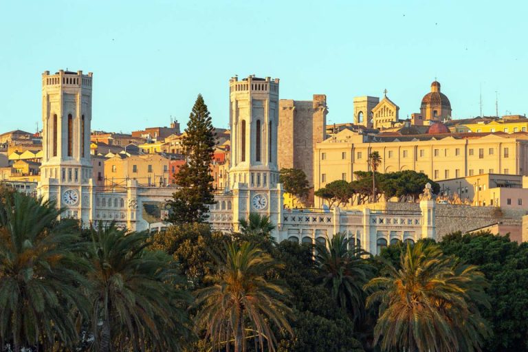 View of the city Cagliari on the island of Sardinia, Italy with the Civic Palace in the foreground.