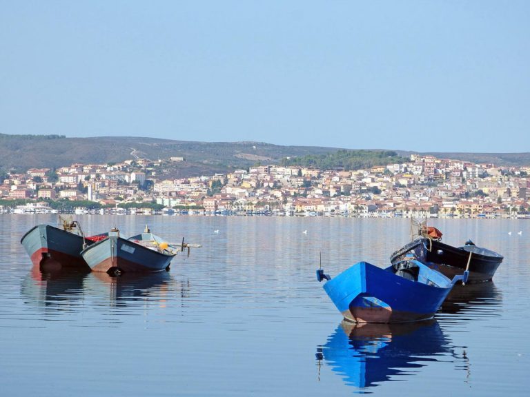 Italy, Sardinia, Sant'Antioco, view of the lagoon and in the background the village of San Antioco