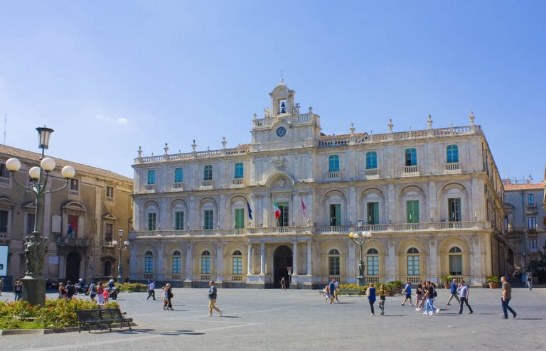 CATANIA, ITALY - September 27, 2019: Palace of the University at University Square (or Piazza Universita) in Catania, Italy, Sicily