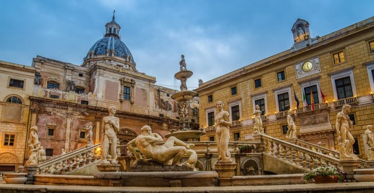 Palermo, Sicily, Italy: baroque Piazza Pretoria in the sunrise. This landmark is also known as square of Shame and is located in the exact center of the historic city of Palermo.