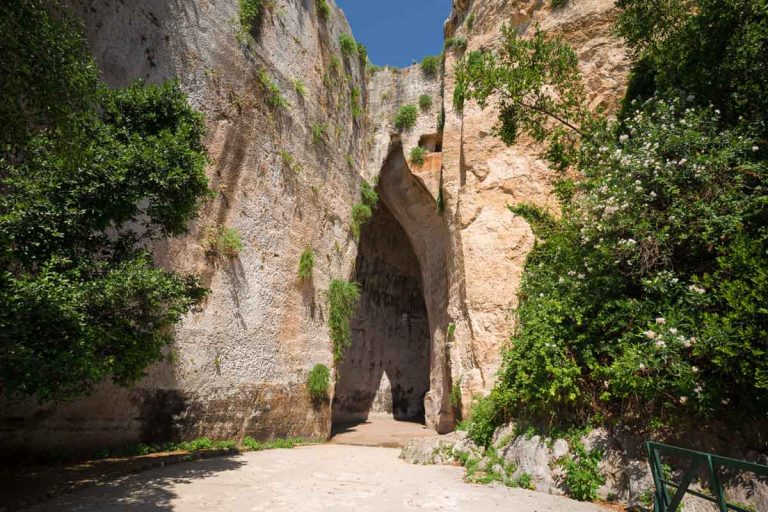 Entrance to the Orecchio di Dioniso cave, near the Greek theater of Syracuse, in Sicily Italy.