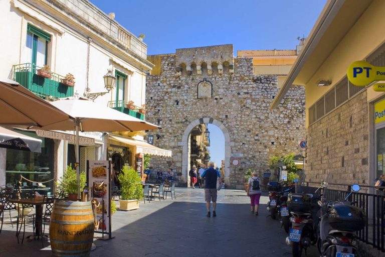 TAORMINA, ITALY - September 30, 2019: Catania Gate (or Porta Catania) in Taormina, Sicily