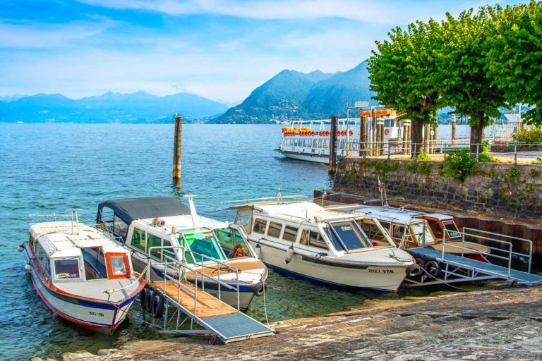 Stresa, Italy - 12 October 2019: Excursion cruise boats on Lake Maggiore on a tour between Borromean Islands, Italy