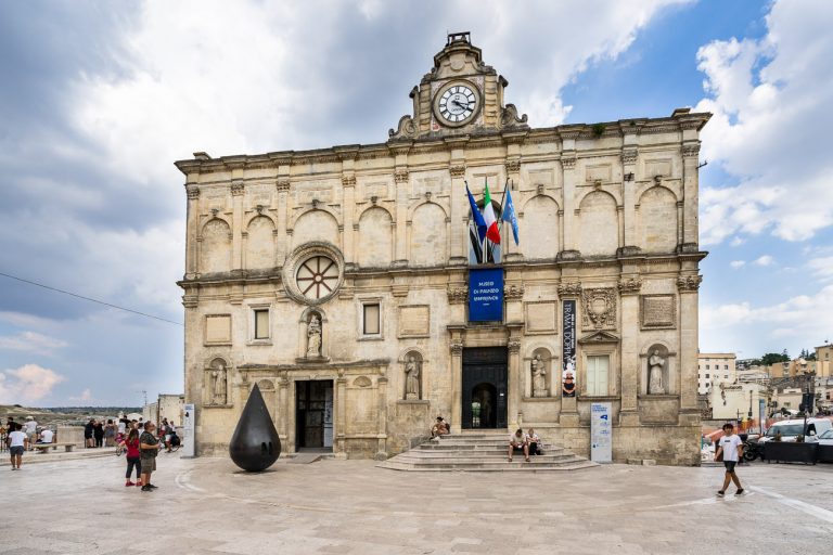 Exterior of Palazzo Lanfranchi, housing the Ancient and Modern Art Museum of Basilicata. Near the facade is located the drop sculpture by Kengiro Azuma. Matera, Italy, August 2020