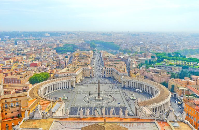 View of the St. Peter's Square and Rome City from the dome of St. Peter's Basilica in Vatican.